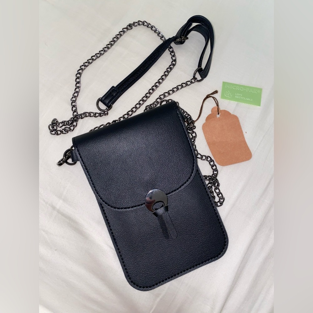 Micro Pak Crossbody Cell Phone Bag. Black bag. New w/Tag.